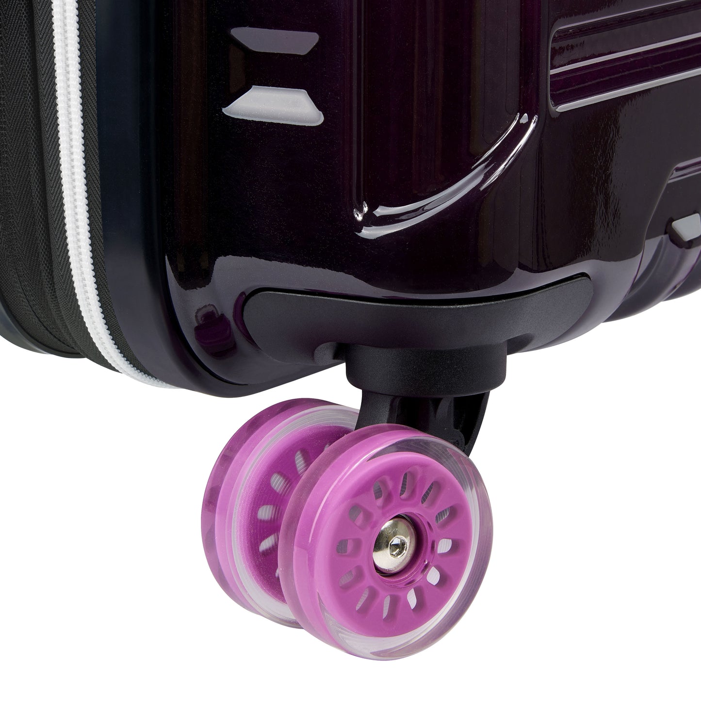 Roda dupla violeta translúcida com design giratório em mala rígida de policarbonato DELSEY, proporcionando mobilidade suave e durabilidade para viagens.