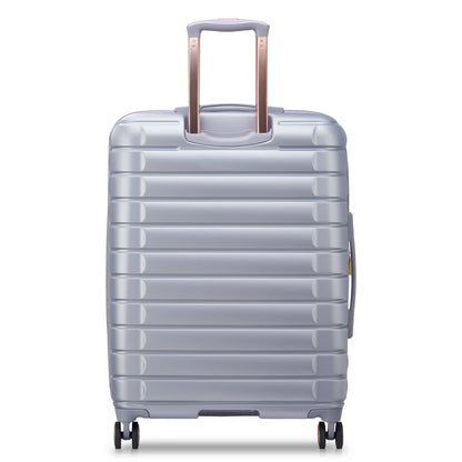 Mala média expansível cinza da DELSEY, rígida e durável, com alça retrátil e rodas giratórias 360°, ideal para viagens e padrão ANAC.