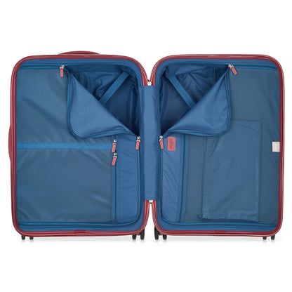 Interior da mala média DELSEY com várias divisórias de tecido azul, bolsos com zíper e cintas para organização eficiente de itens durante viagens.
