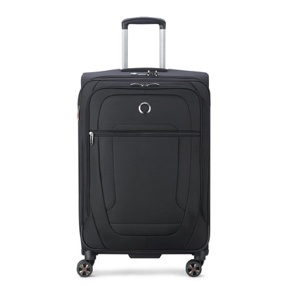 Mala média expansível preta da DELSEY, com tecido resistente, rodas giratórias 360° e alça retrátil, ideal para viagem com design durável e funcional.