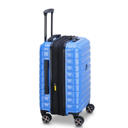 Mala de bordo expansível azul claro da DELSEY, feita em material durável com rodas giratórias 360°, alça retrátil e sistema de zíper antifurto para viagem segura e prática.