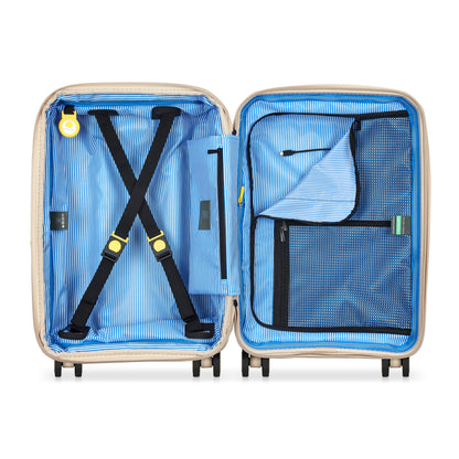 Mala de bordo pequena expansível na cor bege com interior azul, compartimentos organizadores com zíper e cintas cruzadas para melhor fixação da bagagem, marca DELSEY.