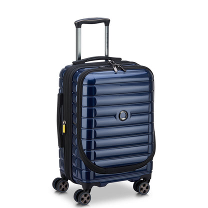 Mala de bordo rígida e expansível DELSEY Paris na cor azul escuro com porta notebook, quatro rodas giratórias e design moderno para viagens com segurança e praticidade.