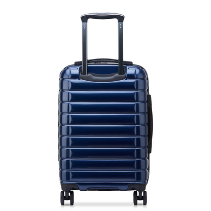 Mala de bordo rígida azul escuro da DELSEY com design moderno, zíper antifurto, alça retrátil e rodas giratórias para maior praticidade em viagens.