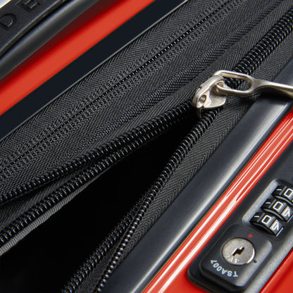 Detalhe do zíper antifurto em mala rígida laranja da DELSEY, coleção Shadow 5.0, destacando expansão e segurança para malas de bordo com porta notebook.