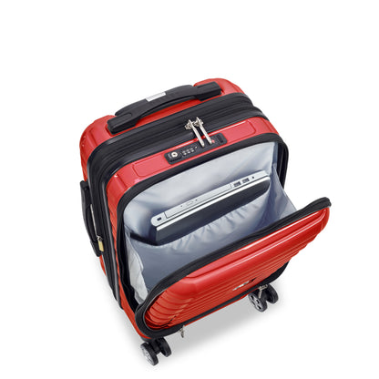 Mala de bordo rígida vermelha da DELSEY com compartimento externo para notebook, zíper expandível e rodas giratórias para maior facilidade em viagens.