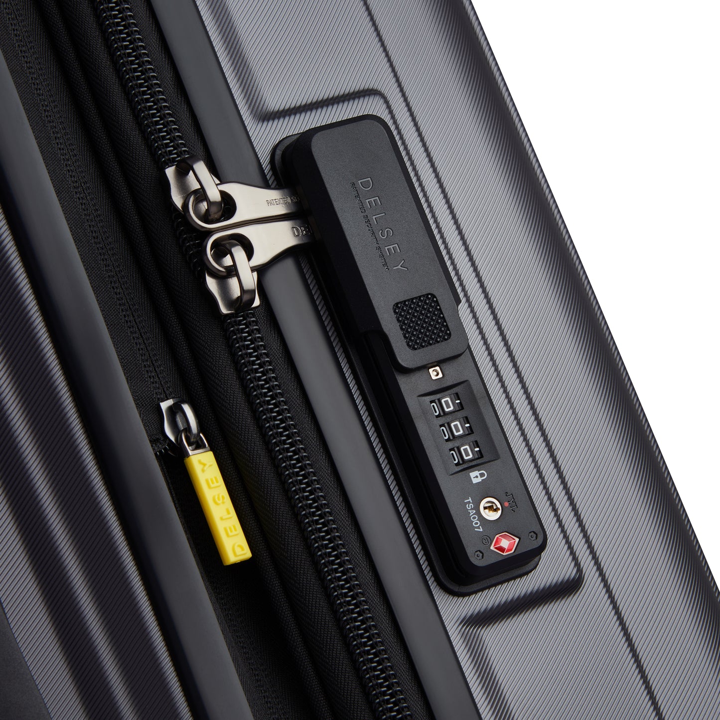 Fechadura com combinação TSA integrada em mala rígida expansível cinza escuro, fabricação DELSEY, que oferece segurança e durabilidade para viagens.