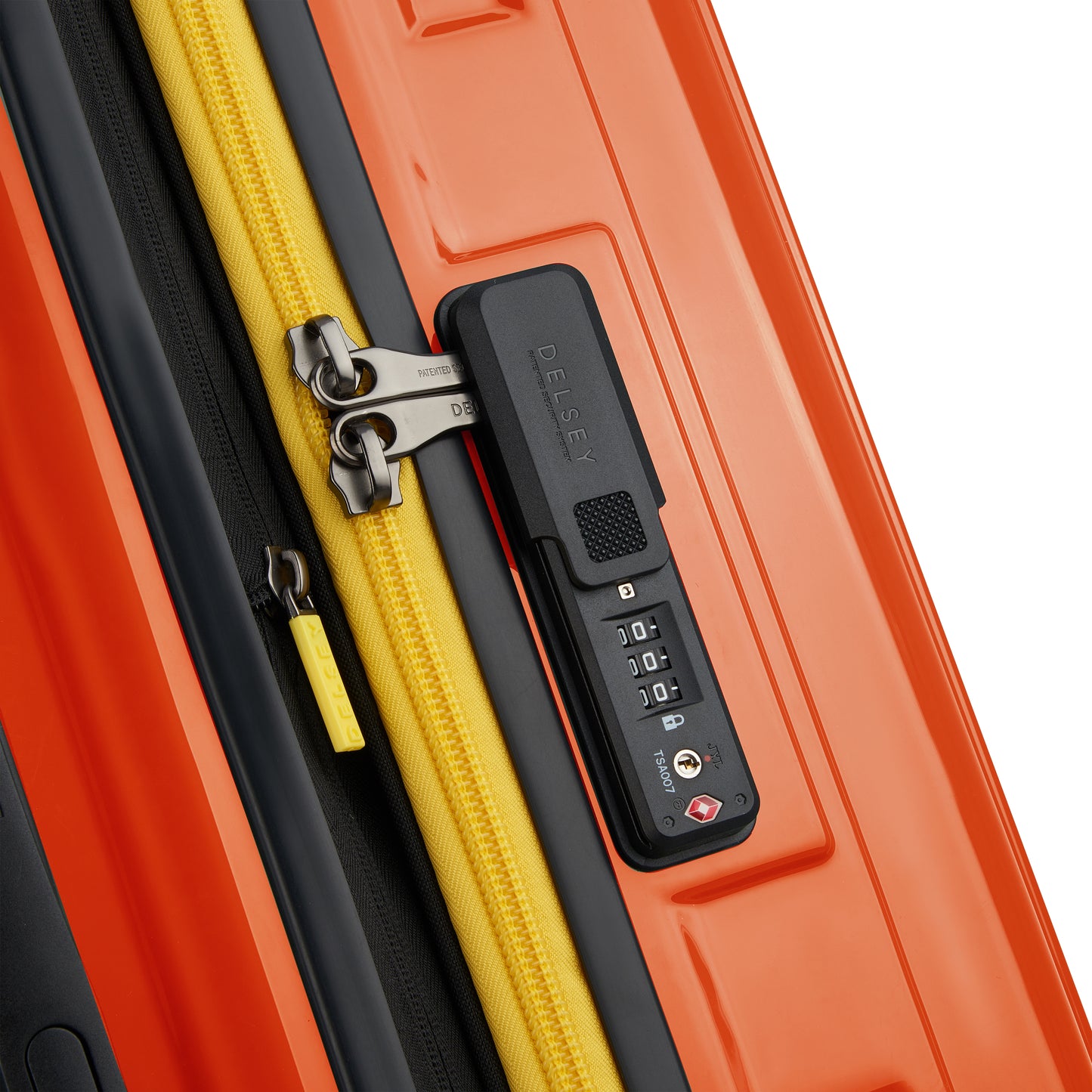 Fechadura TSA integrada em mala rígida laranja da DELSEY com zíper amarelo, proporcionando segurança reforçada e design moderno para viagens.