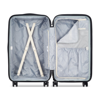 Interior de mala rígida off white da DELSEY com compartimentos organizadores, cintas internas ajustáveis e design funcional para viagem.