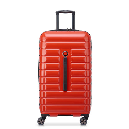 Mala de viagem rígida média no formato trunk, laranja vibrante, com rodas giratórias, design sofisticado e durabilidade garantida pela marca francesa DELSEY.