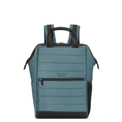 Mochila azul para notebook da DELSEY com design moderno e alças acolchoadas, ideal para transporte seguro com compartimentos funcionais e detalhes em preto.
